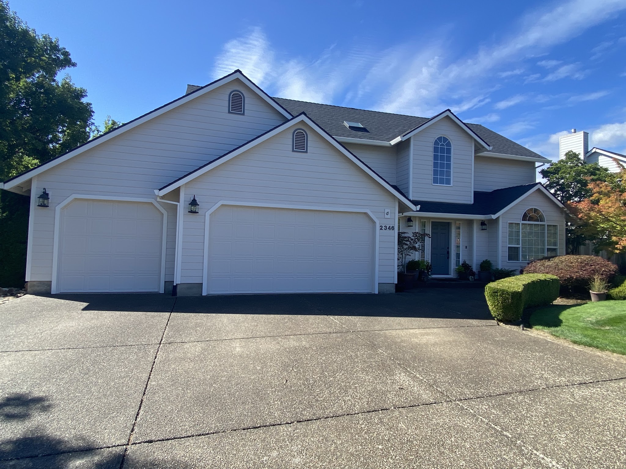 Completed exterior repaint on a two-story home