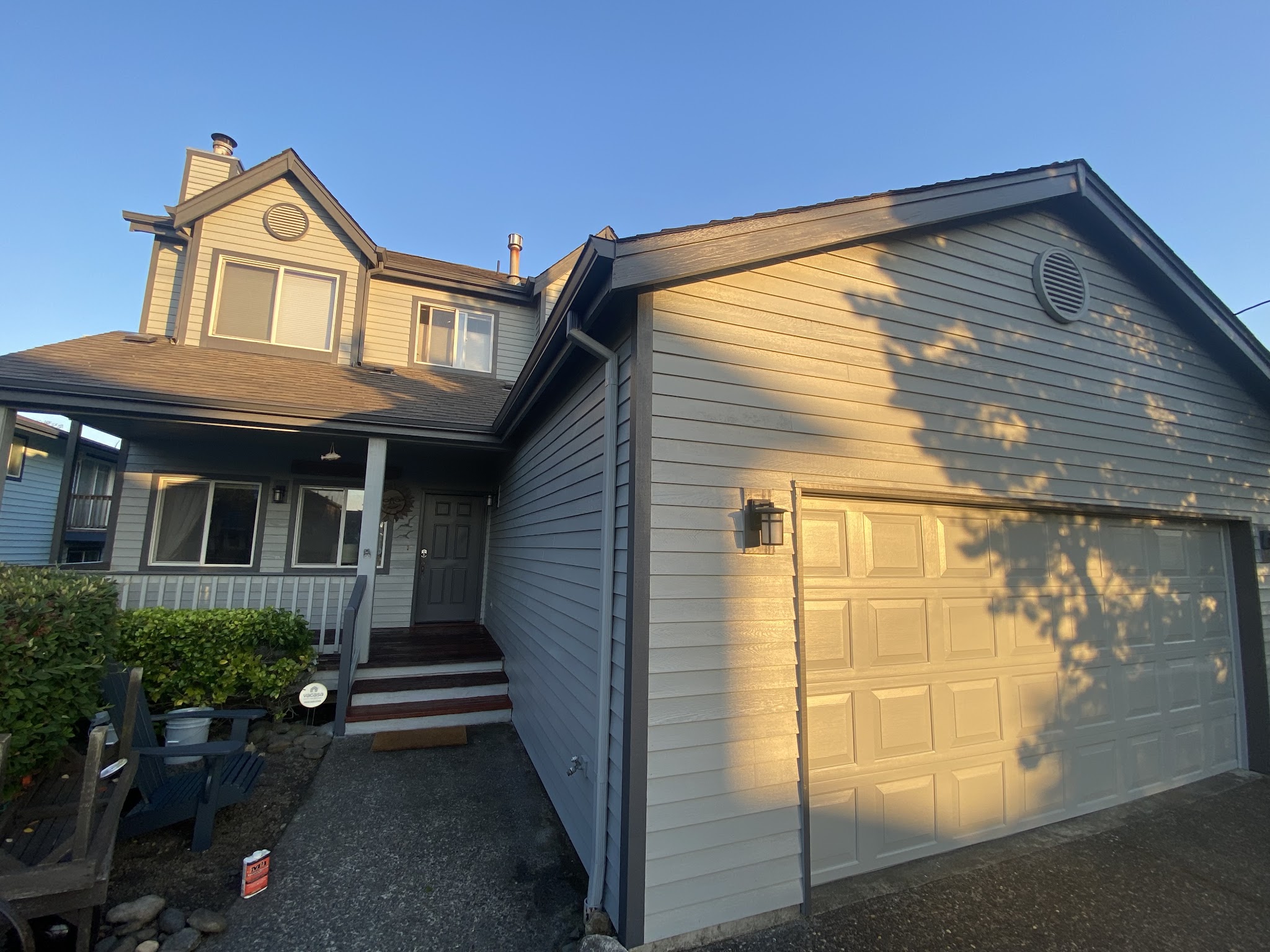 Completed exterior repaint with white trim